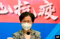 Kepala Eksekutif Hong Kong Carrie Lam dalam konferensi pers di kantor pusat pemerintah di Hong Kong, Rabu, 9 Maret 2022. (Peter Parks/Pool Photo via AP)