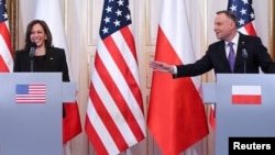 U.S. Vice President Kamala Harris and Polish President Andrzej Duda hold a news conference at Belwelder Palace in Warsaw, Poland, March 10, 2022. 