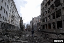 A view shows buildings damaged by recent shelling during Russia's invasion of Ukraine in Kharkiv, Ukraine, March 8, 2022.