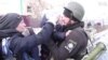 Ukrainian Police Officer Says Goodbye to Distraught Son as Family Flees Irpin 