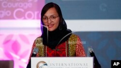 FILE - Zarifa Ghafari, of Afghanistan, speaks during the 2020 International Women of Courage Awards Ceremony at the State Department in Washington, Feb. 4, 2020.