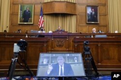 FILE - Amazon CEO Jeff Bezos speaks via video conference during a House Judiciary subcommittee hearing on antitrust on Capitol Hill in Washington, July 29, 2020.