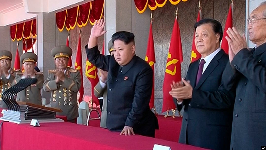 FILE - In an image made from video, North Korean leader Kim Jong Un, center, and Liu Yunshan, China's Communist Party's No. 5 leader, second right, waves during a ceremony to mark the 70th anniversary of the country's ruling party, in Pyongyang, Oct. 10, 