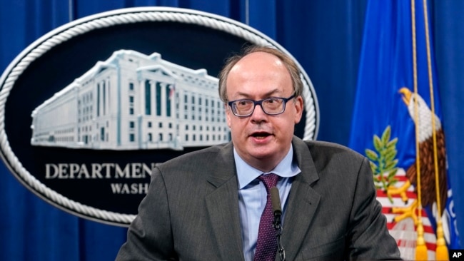 FILE - Jeffrey Clark, then-Assistant Attorney General, speaks during a news conference at the Justice Department in Washington, Sept. 14, 2020.