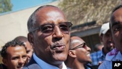 FILE - Ruling party candidate Muse Bihi Abdi speaks to the media after casting his vote in the presidential election in Hargeisa, in the semi-autonomous region of Somaliland, in Somalia, Nov. 13, 2017. 