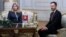 Slovakia's Prime Minister Eduard Heger, right, meets Slovakia's President Zuzana Caputova, after Parliament in a vote expressed no-confidence in his government at the Presidential Palace, in Bratislava, Dec. 15, 2022. (TASR via AP)