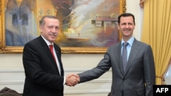 Turkiya Prezidenti Rajab Toyyib Erdog'an Suriya rahbari Bashar Assad bilan. Suriya, 6-fevral, 2011.
