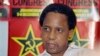 FILE:: In this file photo taken on December 07, 1991 Newly elected secretary general of South African Communist Party (SACP) Chris Hani speaks at a press conference on the third day of the first SACP legal congress inside South Africa in 41 years, in Soweto. 