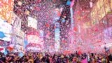 Confetti flies around the ball and countdown clock during the first public New Year's event at Times Square, in the Manhattan borough of New York City, Jan. 1, 2023. 