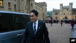 Japan's Prime Minister Fumio Kishida leaves after signing a defense agreement with Britain's Prime Minister Rishi Sunak, in London, Jan. 11, 2023. 