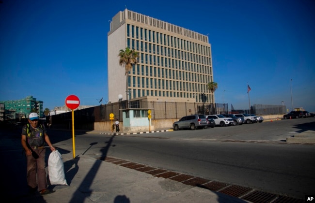 The U.S. embassy stands on the day of its reopening for visa and consular services in Havana, Cuba, Jan. 4, 2023. (AP Photo/Ismael Francisco)