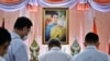 Well-wishers bow in front of an image of Thailand's Princess Bajrakitiyabha Narendira Debyavati, at Chulalongkorn Hospital in Bangkok, Dec. 16, 2022.