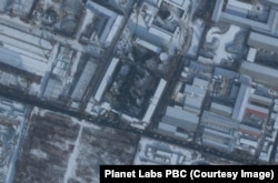 2022年12月27日，衛星圖片顯示在瀋陽市殯儀館外排長龍的車輛（來源：Planet Labs PBC)