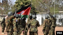 FILE: South Sudan soldiers at the Army headquarters in Juba prepare for deployment, Dec. 28, 2022. (Sheila Ponnie/VOA)