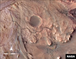 Această hartă arată o cale planificată pe care roverul Perseverance Mars al NASA o va lua până în vârful Deltei Craterului Jezero.  (Credite: NASA/JPL-Caltech)