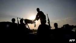FILE - Somali soldiers are seen in the Middle Shabelle region of Somalia, Dec. 10, 2012. 
