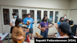 Students practice a traditional style of Thai music at the Department of Ethnomusicology of the traditional music and ritual of Thailand, UCLA. 