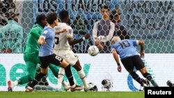 Uruguay's Giorgian De Arrascaeta scores the opening goal against Ghana at the 2022 FIFA World Cup, Al Janoub Stadium, Qatar, December 2, 2022