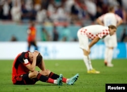 Belgium's Timothy Castagne is dejected as his team was eliminated from the World Cup after a 0-0 draw with Croatia at Ahmad Bin Ali Stadium in Al Rayyan, Qatar, Dec. 1, 2022.