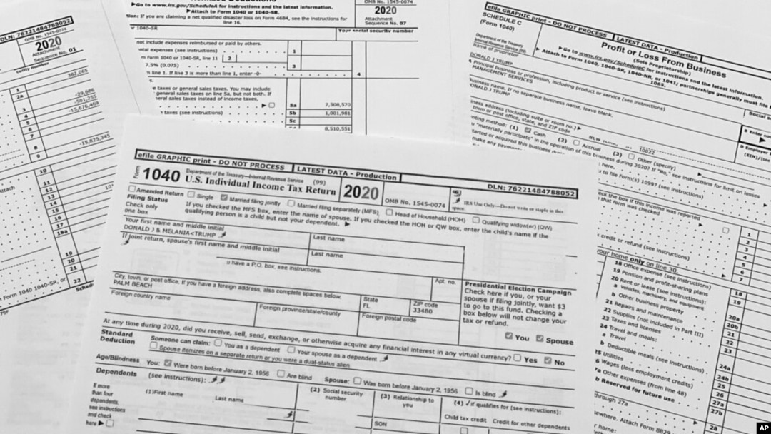 Copies of former President Donald Trump's tax returns for the tax year 2020 are photographed Dec. 30, 2022. 