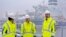 From left, German Economy and Climate Minister Robert Habeck, German Chancellor Olaf Scholz and German Finance Minister Christian Lindner attend the opening of the LNG (Liquefied Natural Gas) terminal in Wilhelmshaven, Germany, Dec. 17, 2022. 