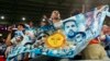 Argentina fans celebrate their team progressing to the quarter finals after defeating Australia at the 2022 FIFA World Cup