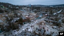 Houses destroyed by Russian forces are seen from above in the recently liberated village of Bogorodychne, Ukraine, Jan. 13, 2023.