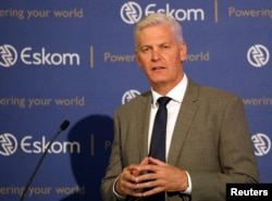 FILE - Andre de Ruyter, Group Chief Executive of state-owned power utility Eskom speaks during a media briefing in Johannesburg, South Africa, Jan. 31, 2020.