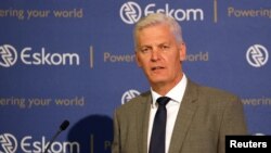 FILE - Andre de Ruyter, Group Chief Executive of state-owned power utility Eskom speaks during a media briefing in Johannesburg, South Africa, Jan. 31, 2020.