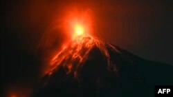 Fuego volcano, as seen from Alotenango, a municipality in Sacatepequez department, 65 kilometers southwest of Guatemala City, erupts.