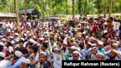 FILE - Rohingya refugees gather at the Kutupalong Refugee Camp in Cox's Bazar, Bangladesh, August 25, 2022, to mark the fifth anniversary of their fleeing from neighboring Myanmar to escape a military crackdown in 2017. 