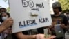 Cannabis supporters hold piece of cannabis during gather outside the Government House in Bangkok, Thailand, Nov. 22, 2022. 