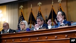 Rep. Jamie Raskin, right, speaks as the House select committee investigating the Jan. 6 attack on the U.S. Capitol holds its final meeting on Capitol Hill in Washington, Dec. 19, 2022. 