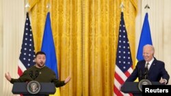 U.S. President Joe Biden and Ukraine's President Volodymyr Zelenskiy hold a joint news conference in the East Room of the White House in Washington, U.S., December 21, 2022.