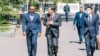 This handout image taken and distributed on Jan. 10, 2023, by the Ethiopian Prime Minister's Office in Addis Ababa shows Chinese Foreign Minister Qin Gang (2nd L) walking with Ethiopian Prime Minister Abiy Ahmed (L) during their bilateral meeting at the Prime Minister's office.