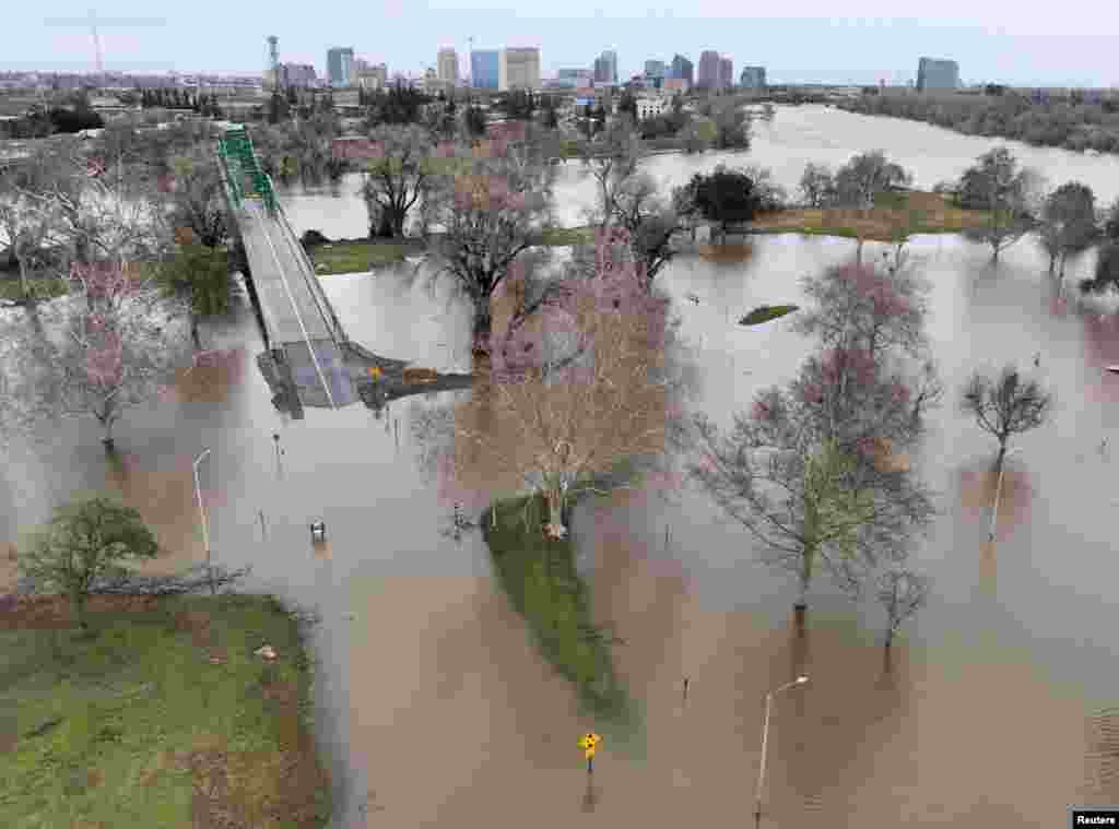 This image shows flooding from the Sacramento and American Rivers, near downtown Sacramento, California, Jan. 11, 2023.