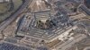 FILE - The Pentagon is seen from Air Force One as it flies over Washington, March 2, 2022. 