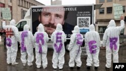FILE - Protesters wear clothes reading 'Free Olivier' during a solidarity demonstration calling for the release from Iranian custody of Belgian aid worker Olivier Vandecasteele, in Brussels, Belgium, Dec. 25, 2022. 