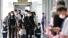 资料照片：2023年1月9日，中国开放边境后，中国乘客抵达泰国曼谷的素万那普国际机场。（美联社照片）
