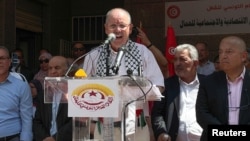 ARCHIVES-Noureddine Taboubi, secrétaire général de l'Union Générale Tunisienne du Travail (UGTT) prend la parole lors d'une grève nationale à Tunis, en Tunisie, le 16 juin 2022.