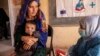 Afghan Women Following Taliban's Rules Still Banned from NGO Work 