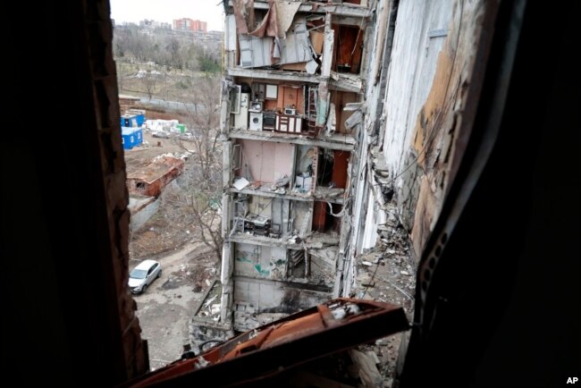 A view of an apartment building, damaged during heavy fighting, in Mariupol, in the Russian-controlled Donetsk region, eastern Ukraine, Jan. 5, 2023.