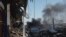 Plumes of smoke rise from a Russian strike during a 36-hour cease-fire over Orthodox Christmas declared by Russian President Vladimir Putin, as Russia's attack on Ukraine continues, from the frontline Donbas city of Bakhmut, Ukraine, Jan. 7, 2023. 