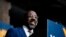 FILE - Sen. Raphael Warnock, D-Ga., speaks during a rally on Dec. 1, 2022, in Atlanta. Warnock is running against Republican Herschel Walker in a runoff election. 