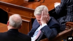 Rep. Kevin McCarthy of California sits in the U.S. House of Representatives chamber after the 13th round of voting for the speaker, Jan. 6, 2023. 