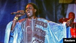 FILE - Senegalese musician Baaba Maal performs at the Voices of Freedom concert staged by the Tobago House of Assembly at the Pigeon Point Heritage Park on the island of Tobago, November 26, 2011.