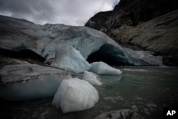 The Nigardsbreen glacier in Norway has lost almost 3 kilometers in length in the past century, August 5, 2022. (AP Photo/Bram Janssen)
