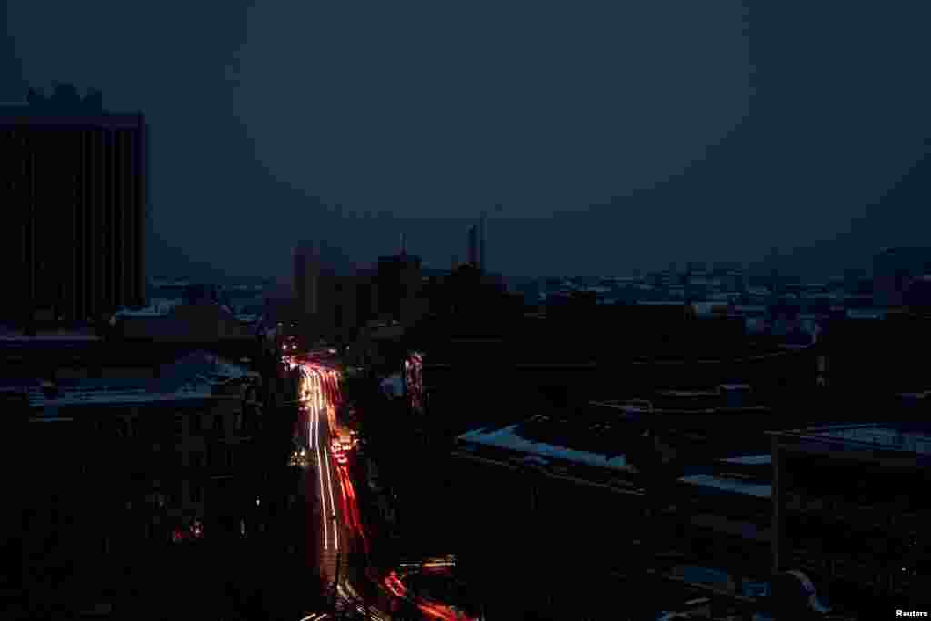 This image shows the city without electricity after critical civil infrastructure was hit by Russian missile attacks in Kyiv, Ukraine.