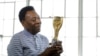 Pele "Improving" in Cancer Fight