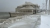 Hoak's restaurant is covered in ice from the spray of Lake Erie waves during a winter storm that hit the Buffalo region in Hamburg, New York, Dec. 24, 2022. 